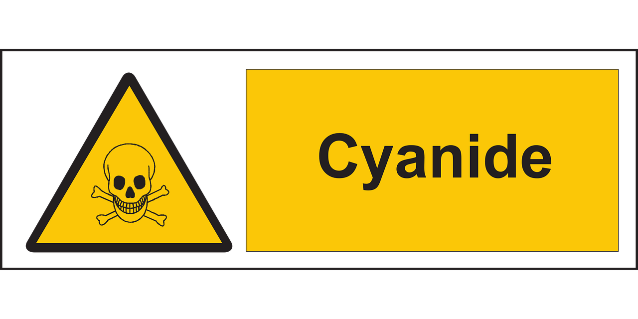 Representación gráfica o simbólica del cianuro, quizás con señal de prohibición o en contexto de laboratorio.