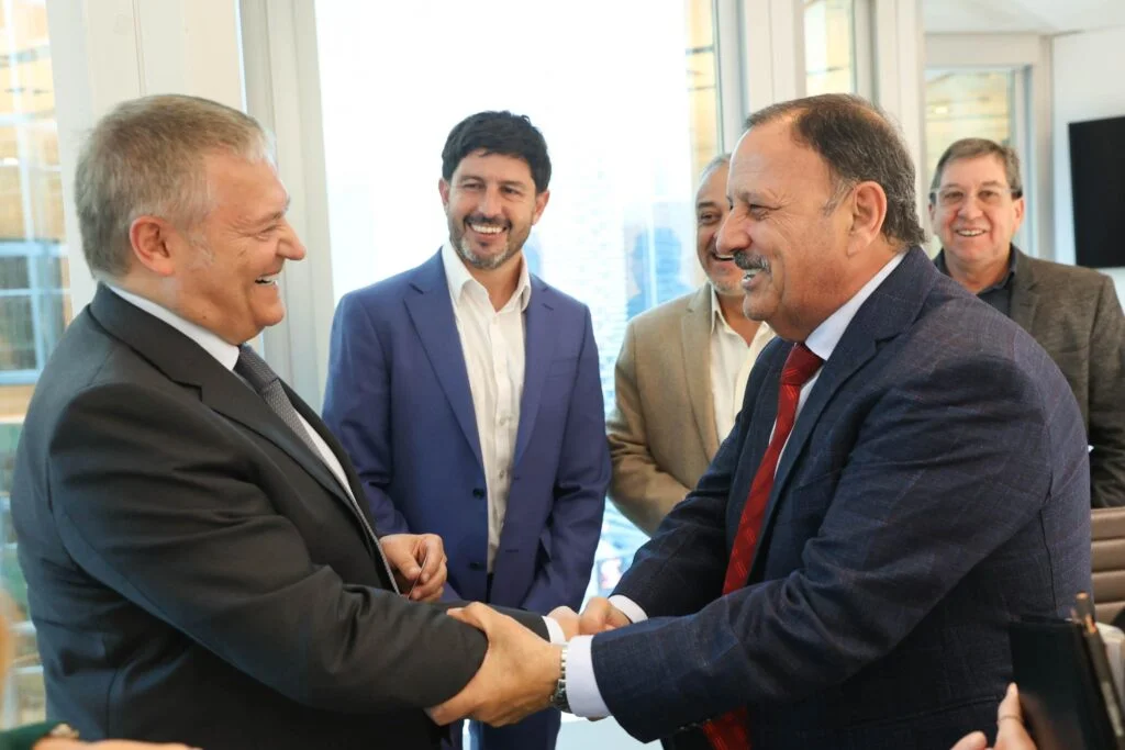 Quintela y Marrone en una reunión.